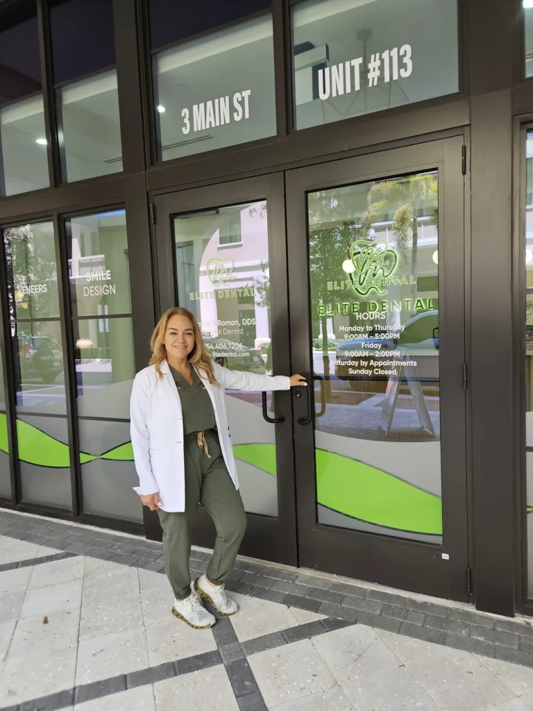 Dr. Maria A. Roman at the Elite Dental Touch front door, 3 Main St, Suite 113, Miramar